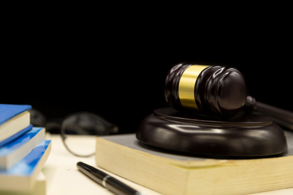 judges-gavel-book-wooden-table-law-justice-concept-background